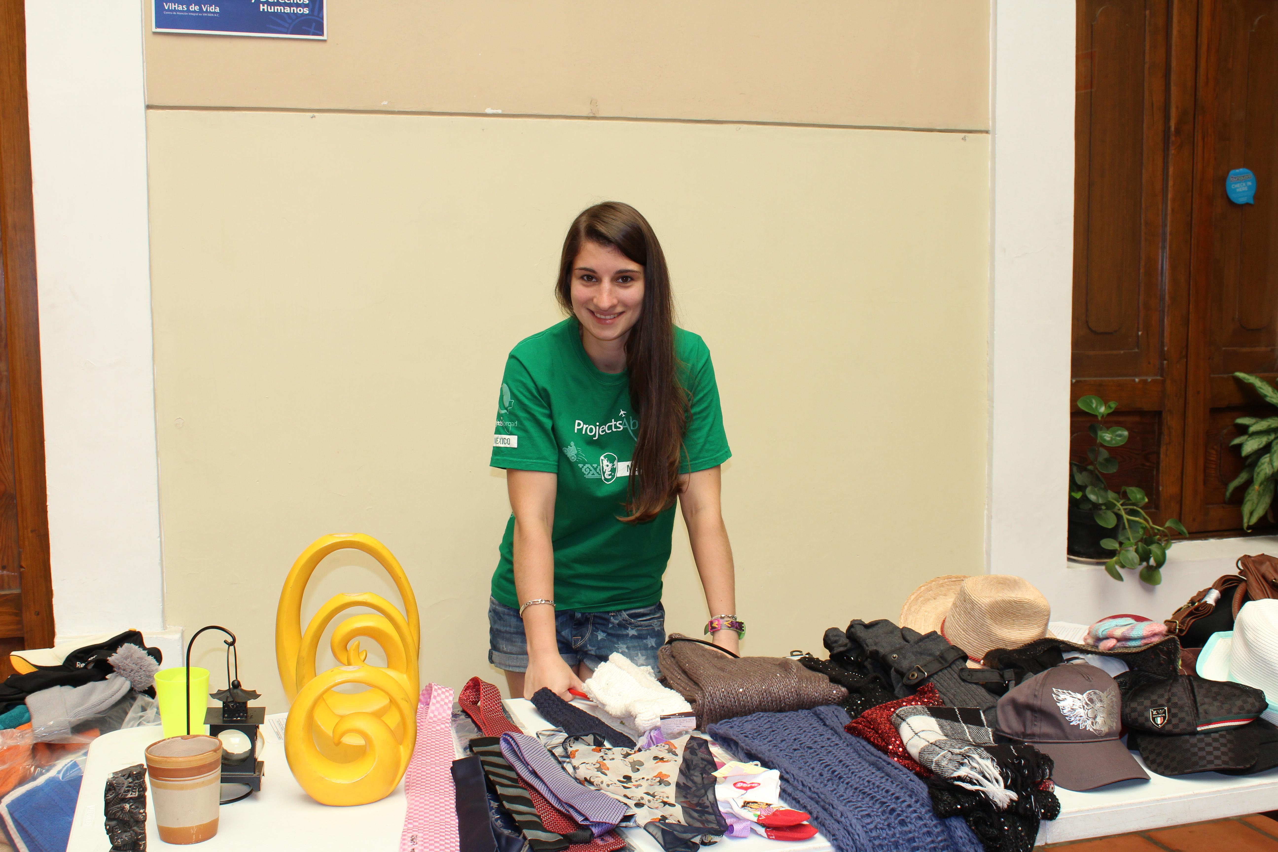 A Business intern help run a stall to support a local entrepreneur's business venture in Mexico. A Projects Abroad Business intern spend time at a beneficiary's small stall as part of her internship in Mexico.